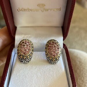 Earrings light purple gemstone with silver and gold accents.  Never worn